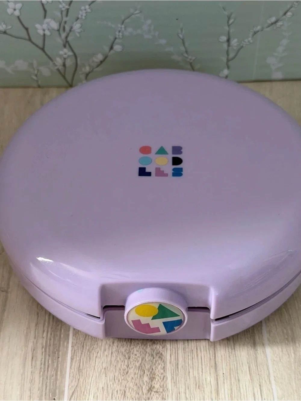 Caboodles Lavender Round Makeup Case with Colorful Logo